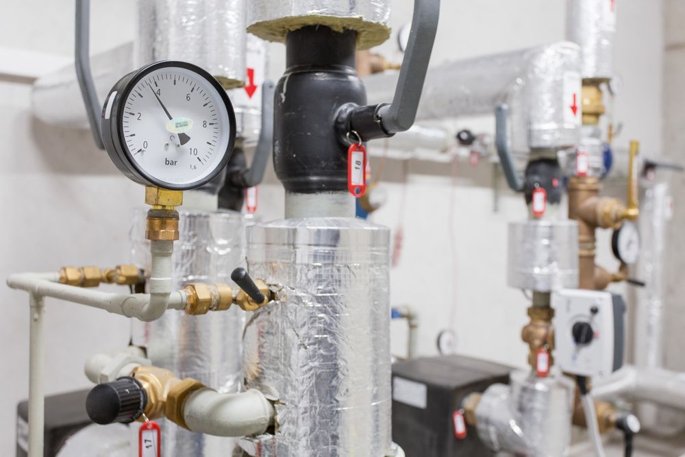 A Room Filled With Lots of Pipes and Gauges — Puzzles Plumbing & Excavations in Casino, NSW