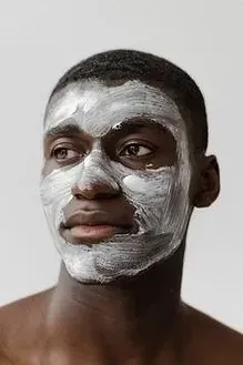 A man with a white mask on his face