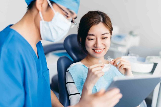 A dentist guiding his patient — Stuttgart, AR — The Dental Clinic of Stuttgart