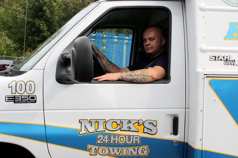 Kris from Wallington Truck Repair behind the wheel of Nick’s 24-hour towing van in Wallington, NJ