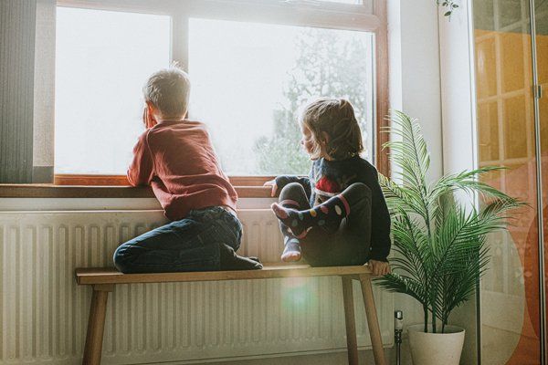 Children Looking Outside the Window — Boone NC — Boone Heating & Air Conditioning Inc Children Looking Outside the Window — Boone NC — Boone Heating & Air Conditioning Inc