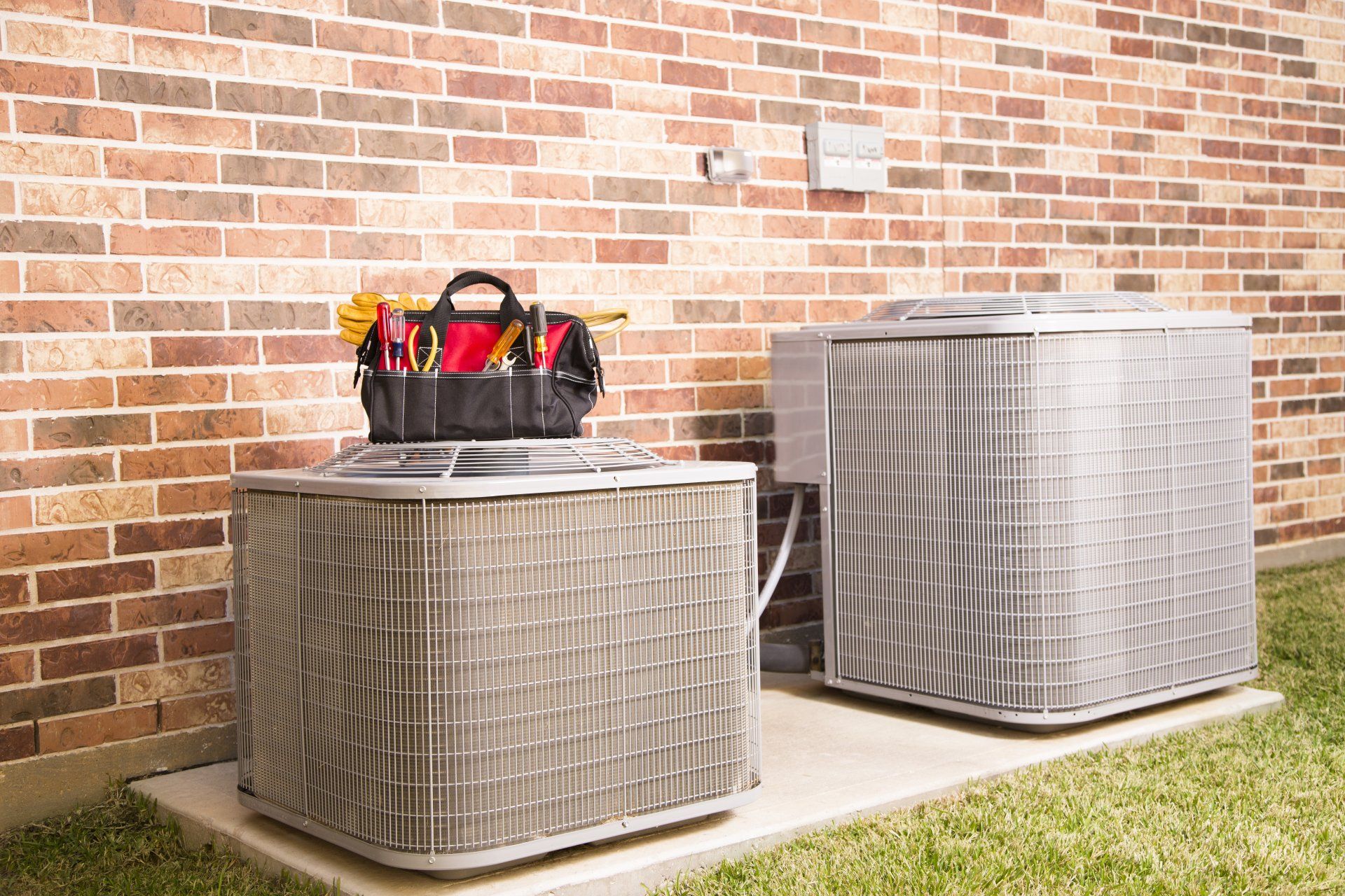 Comfortable People Sitting on a Couch — Boone NC — Boone Heating & Air Conditioning Inc