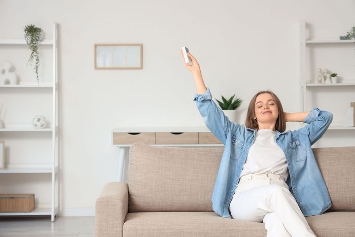 Comfortably adjusting indoor temperature with a system installed by a residential air conditioning contractor.