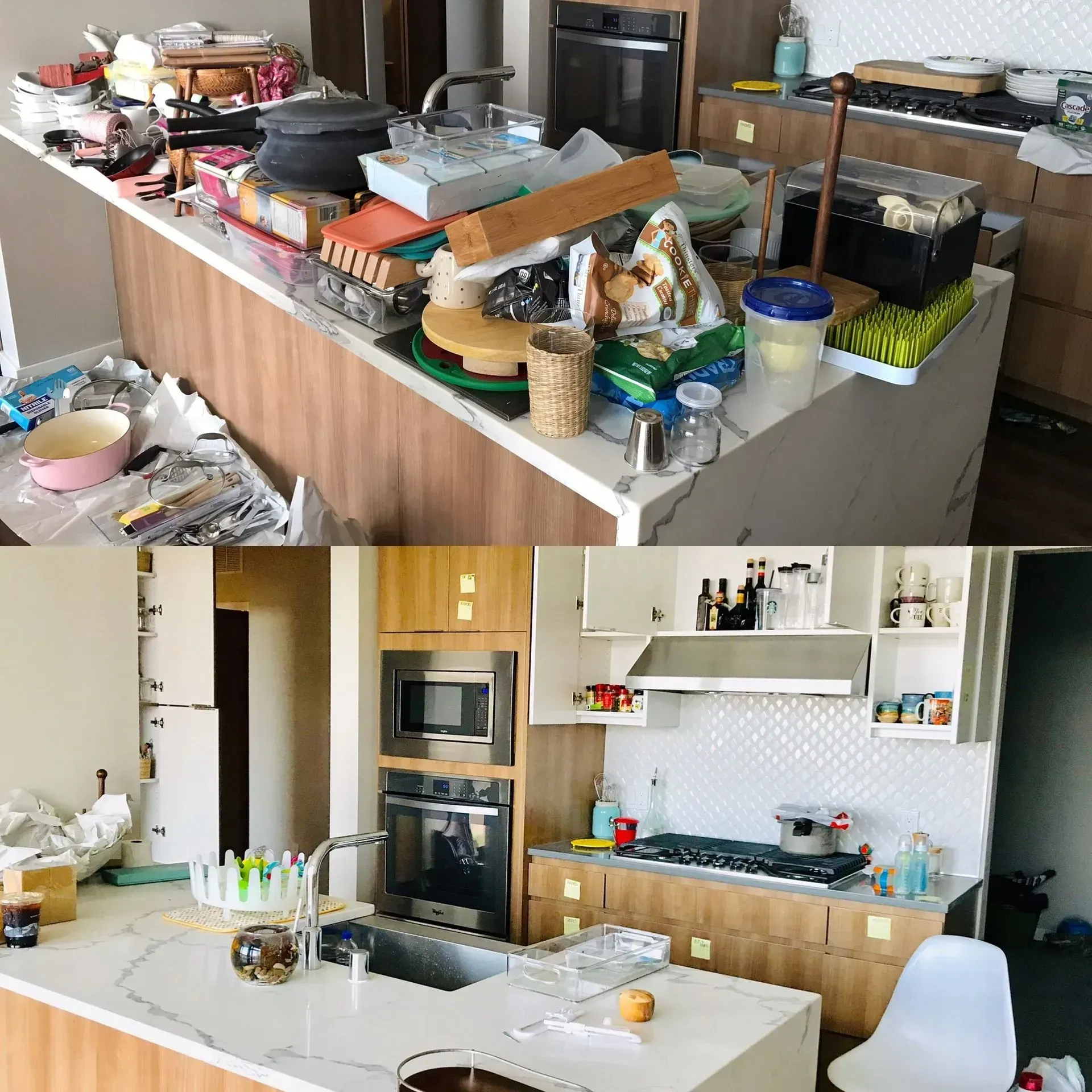 Cluttered modern kitchen with dishes and containers piled on counters and island.