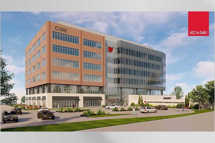 Office building exterior with brick and glass, CORE signage, REDWOOD OFFICE logo, cars in front, sunny.