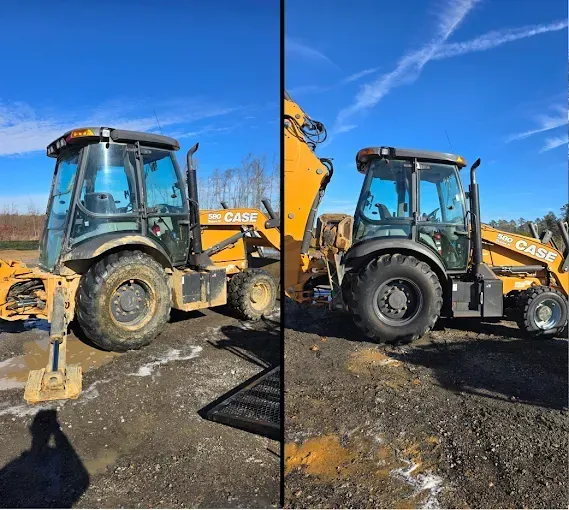 Two backhoe loaders, one dirty, the other clean, against a blue sky.