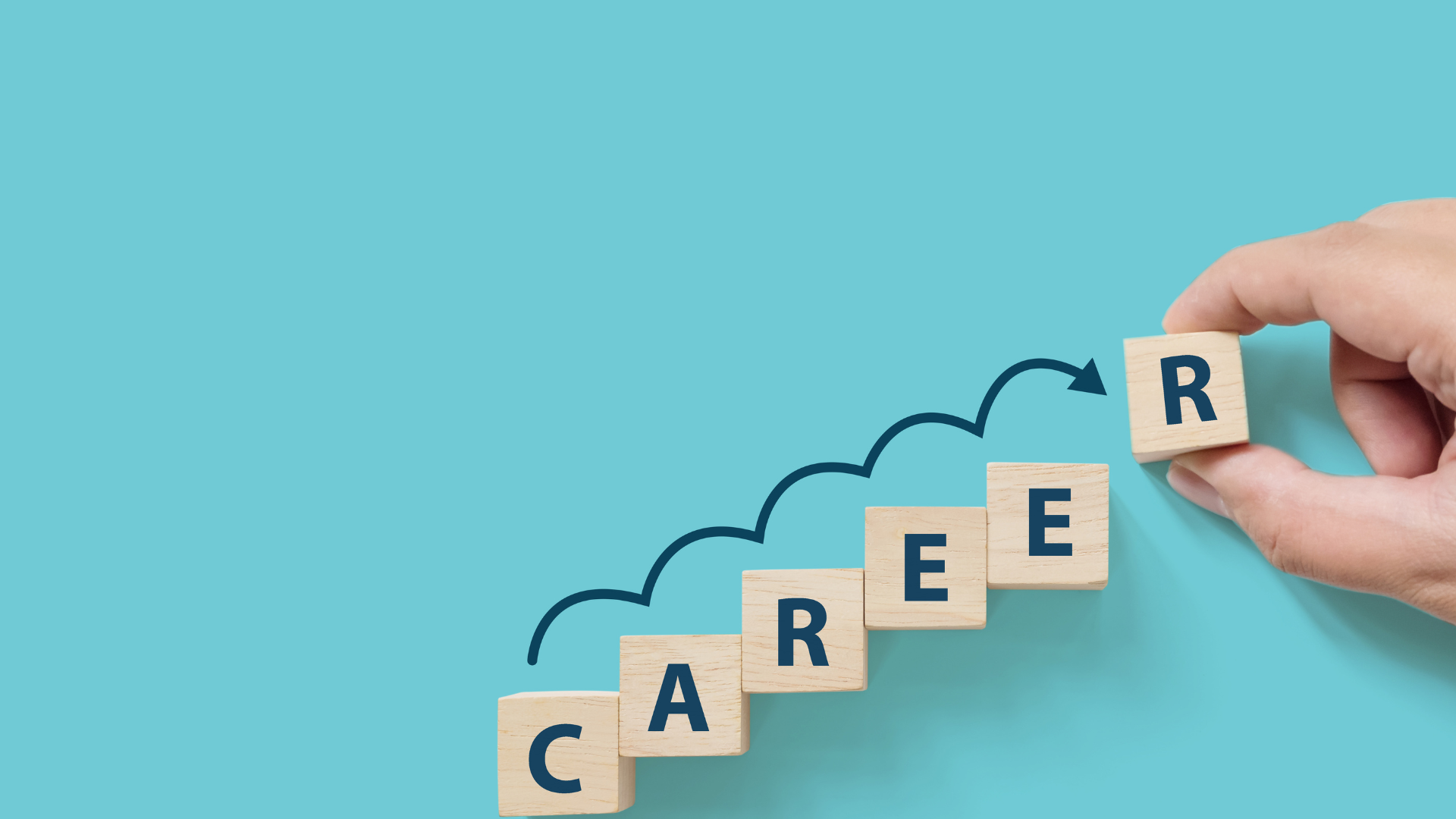 A person is holding a wooden block with the word career written on it.
