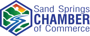 Sand Springs Chamber of Commerce logo with blue, green, orange, and white geometric icon