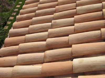Terracotta roof tiles arranged in overlapping rows on a sloped roof