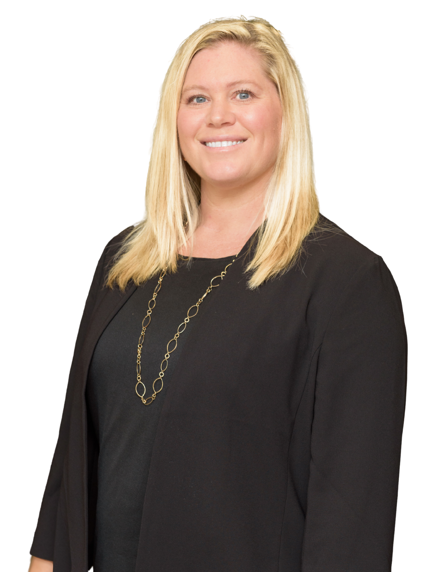 A woman is wearing a black shirt and a gold necklace.