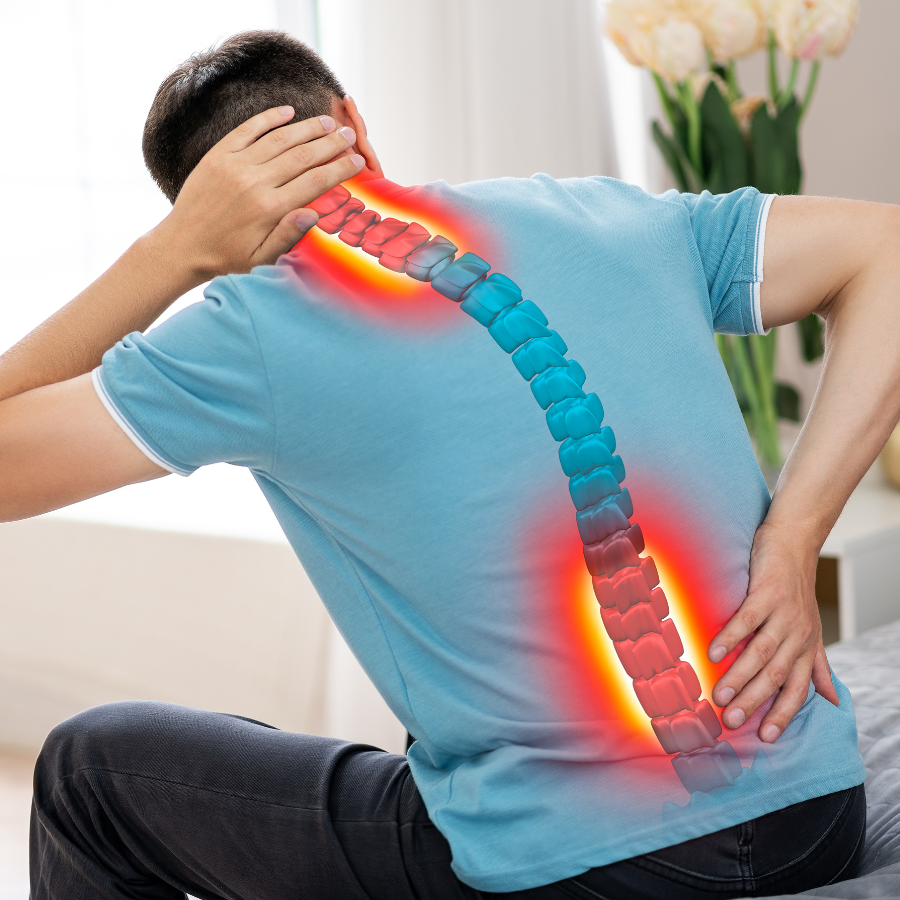 Man holding his back from Sciatica