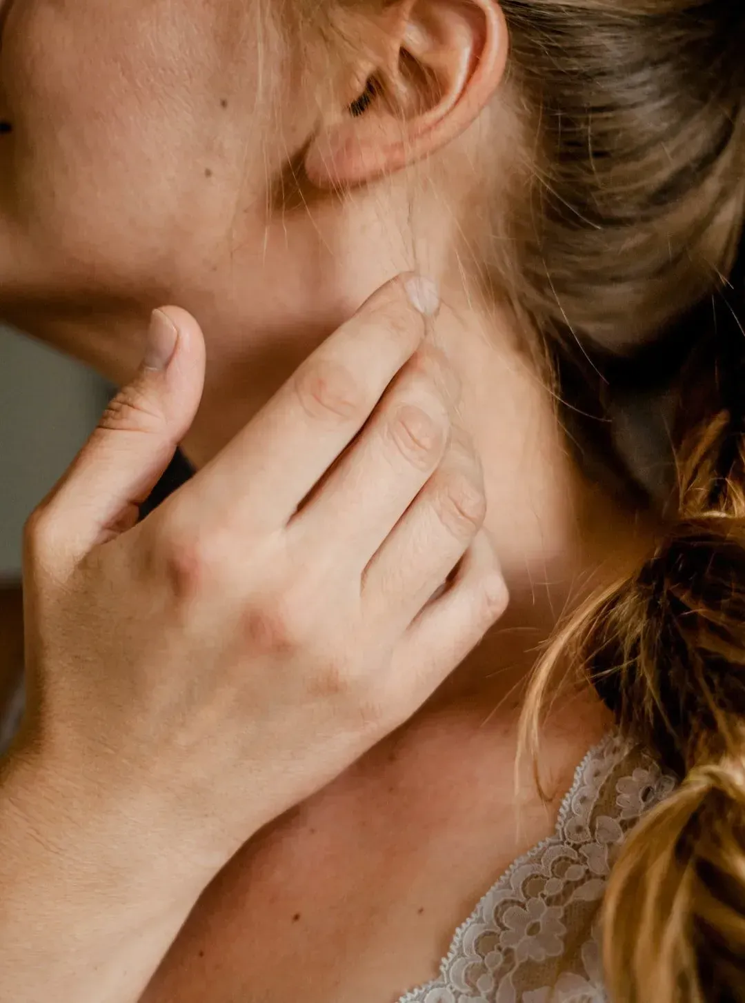 Touching a neck