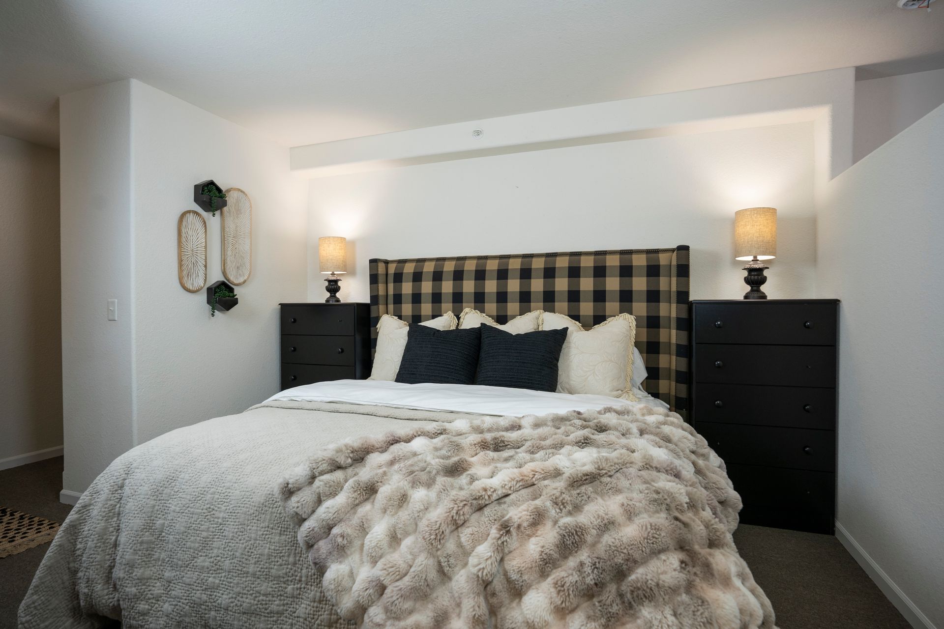 small bedroom with pretty bed