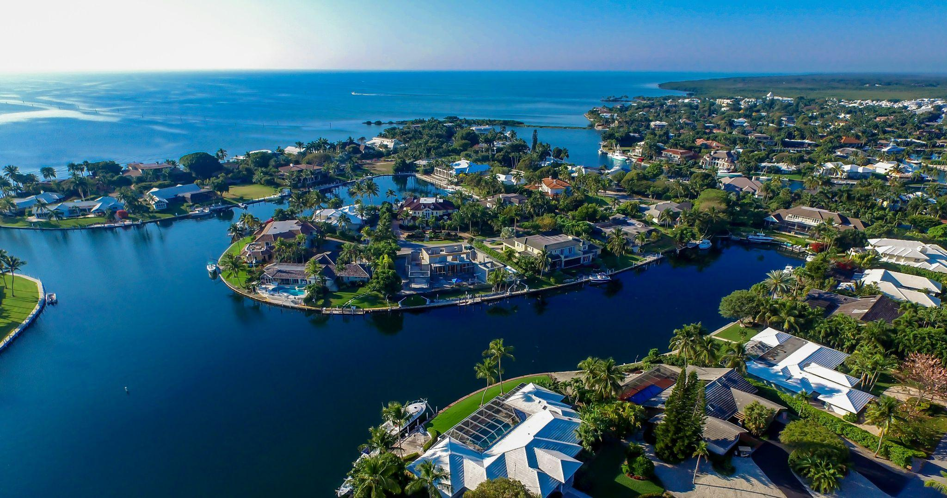 An ocean reef club showing housing surrounded by blue water