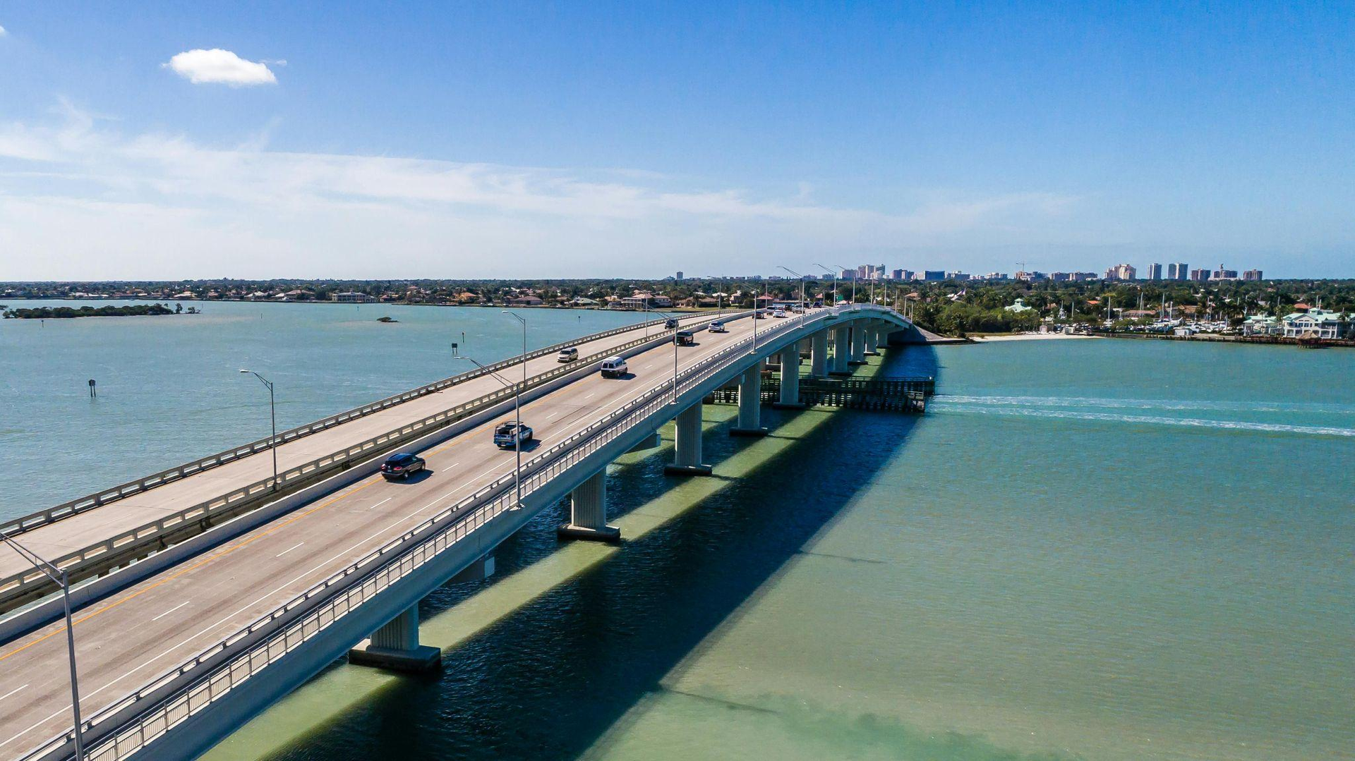 multiple vehicles travelling across a bridge