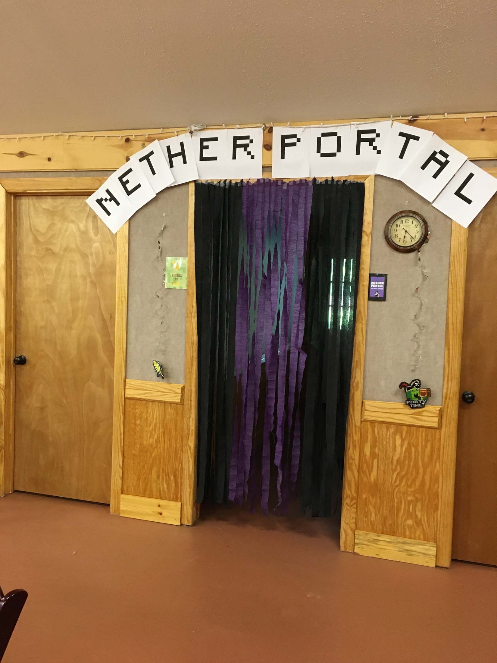 Wooden fort doorway with a purple curtain, arched “NETHER FORT…” sign, and small wall decorations.
