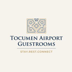 Tocumen Airport Guestrooms logo with gold geometric emblem and navy text on a light background, “Stay.Rest.Connect”