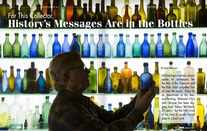 Silhouetted person examining a blue bottle in front of a colorful display of bottles and jars