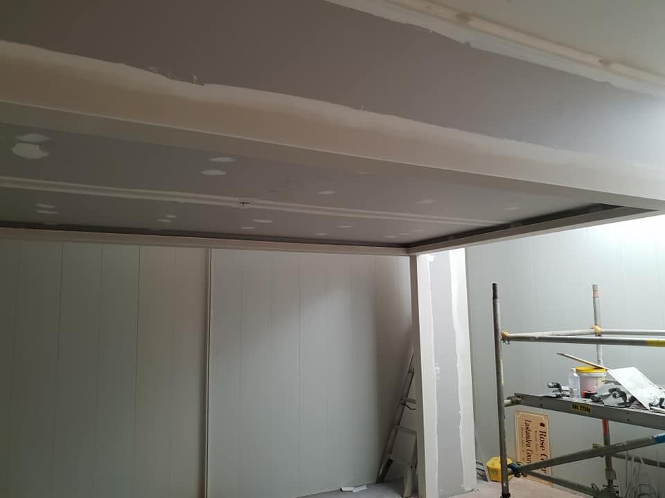 Partially Finished Room With Drywall and Construction Scaffolding — Damien Thompson Plastering King Creek, NSW