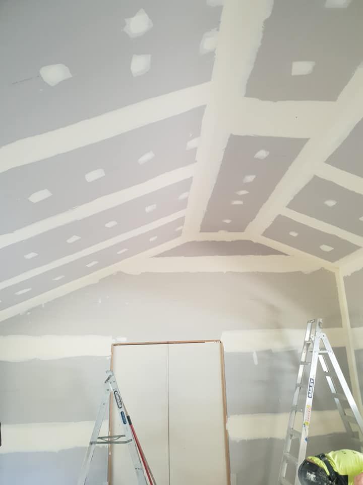 Partially Finished Room Ceiling With Drywall Patches and Unfinished Doorway — Damien Thompson Plastering King Creek, NSW