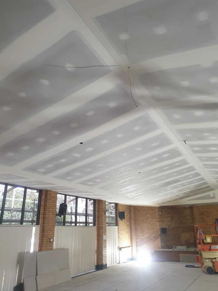 Unfinished Room With Drywall Ceiling and Construction Materials — Damien Thompson Plastering King Creek, NSW