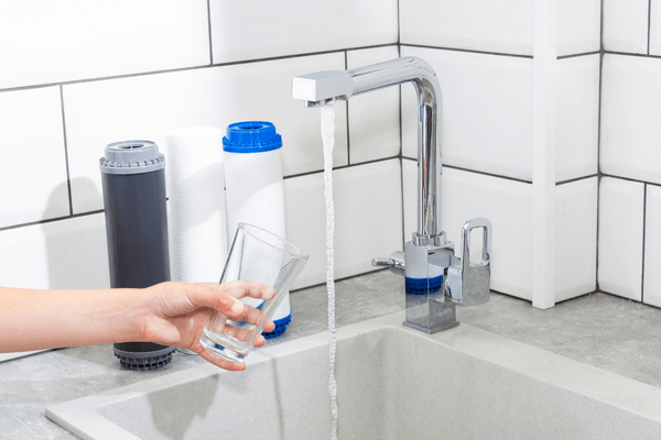 getting a glass of water in the tap