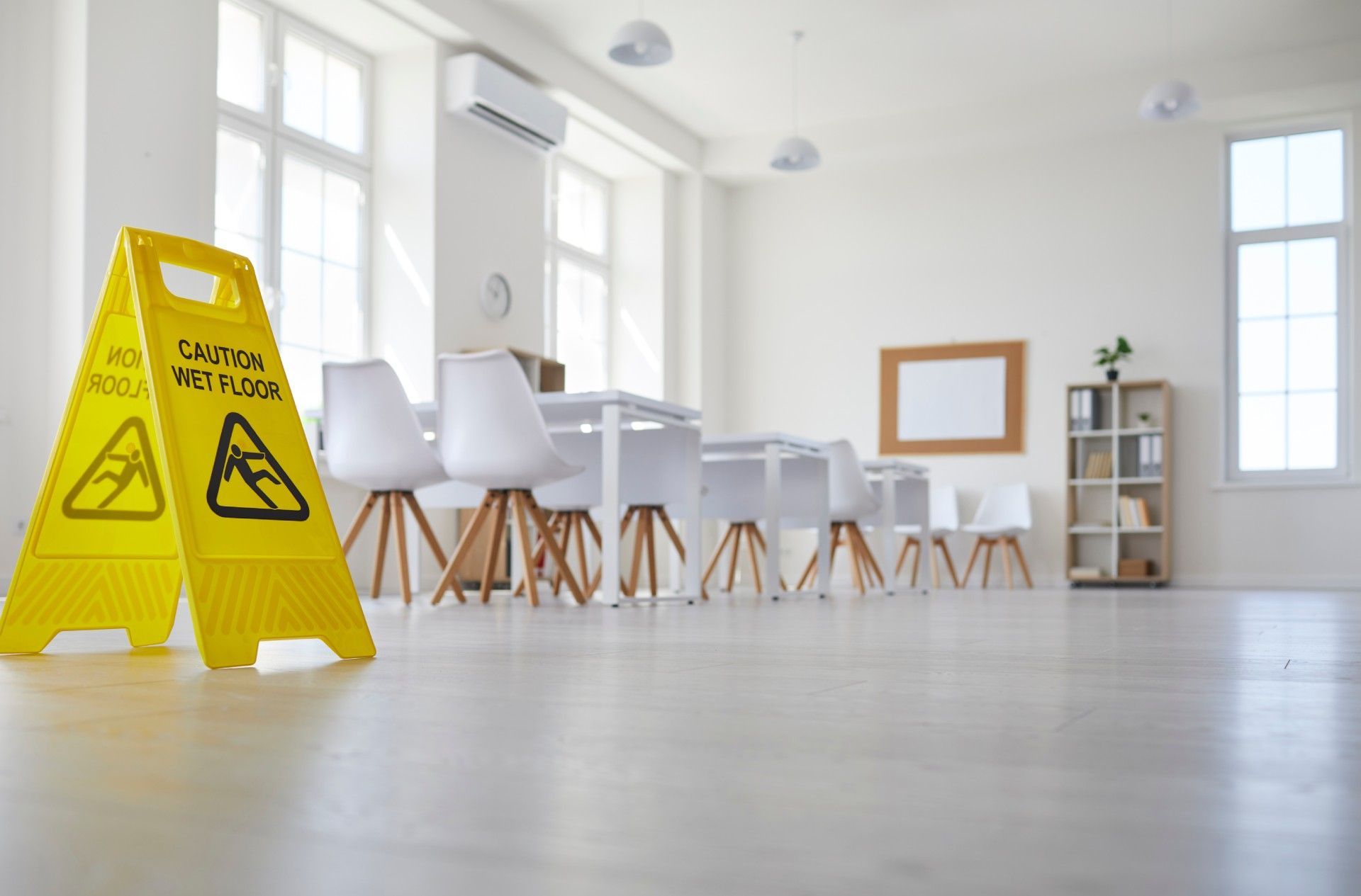 There is a yellow caution sign in the middle of the room.