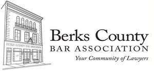 A black and white logo for berks county bar association
