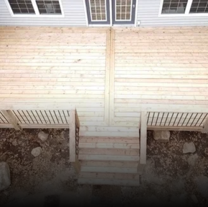 An aerial view of a wooden deck with stairs