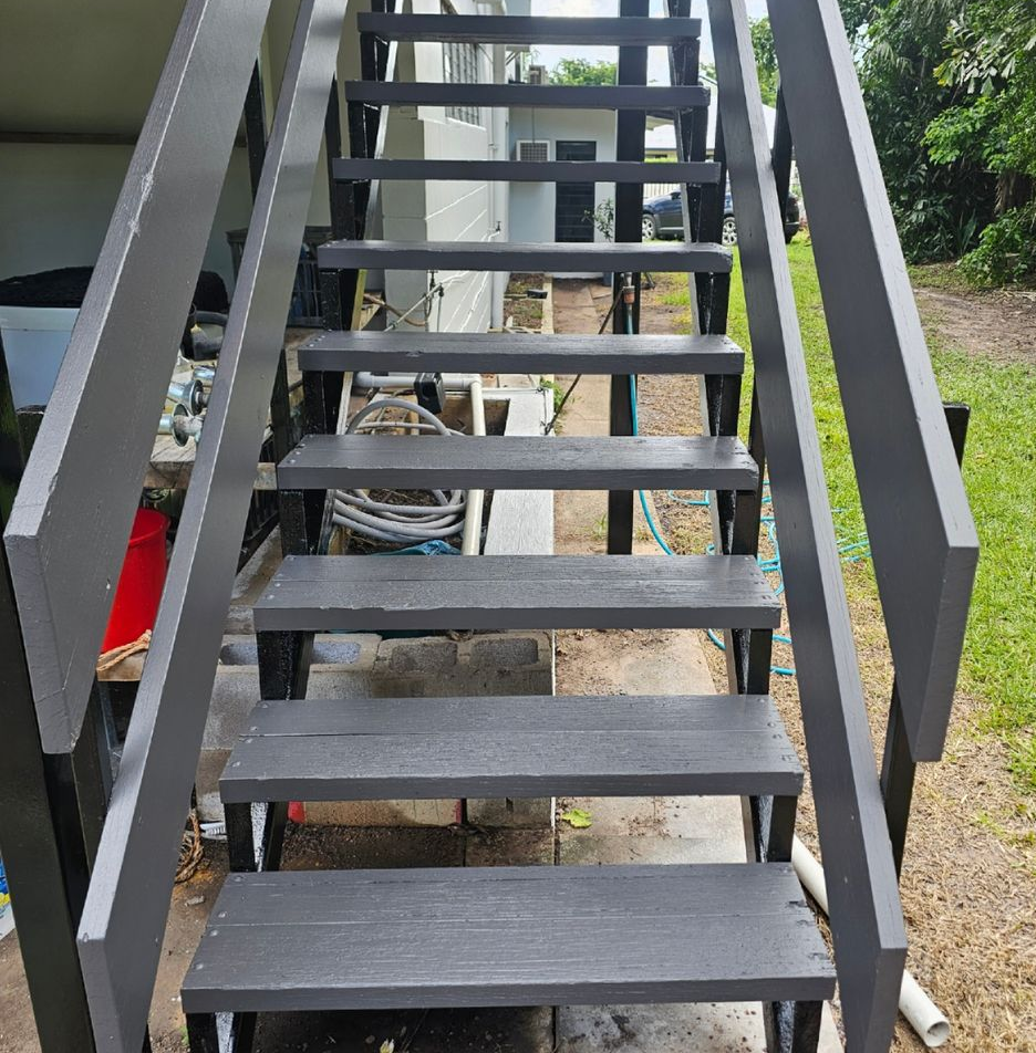 Grey painted exterior staircase with black metal supports — Prestige Painting NT in Zuccoli, NT