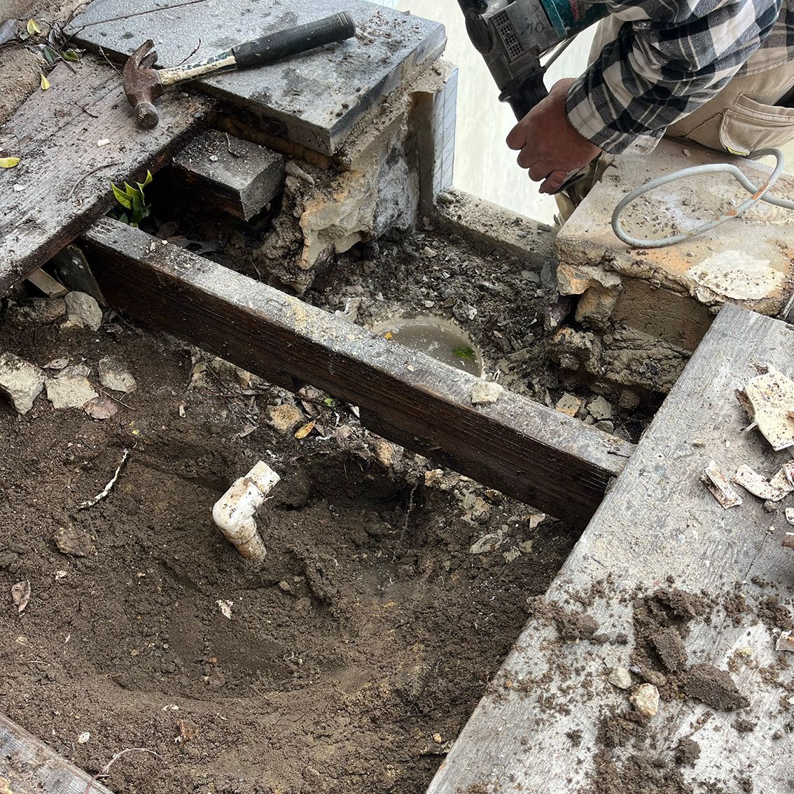 Pool Repair with Man on checker shirt