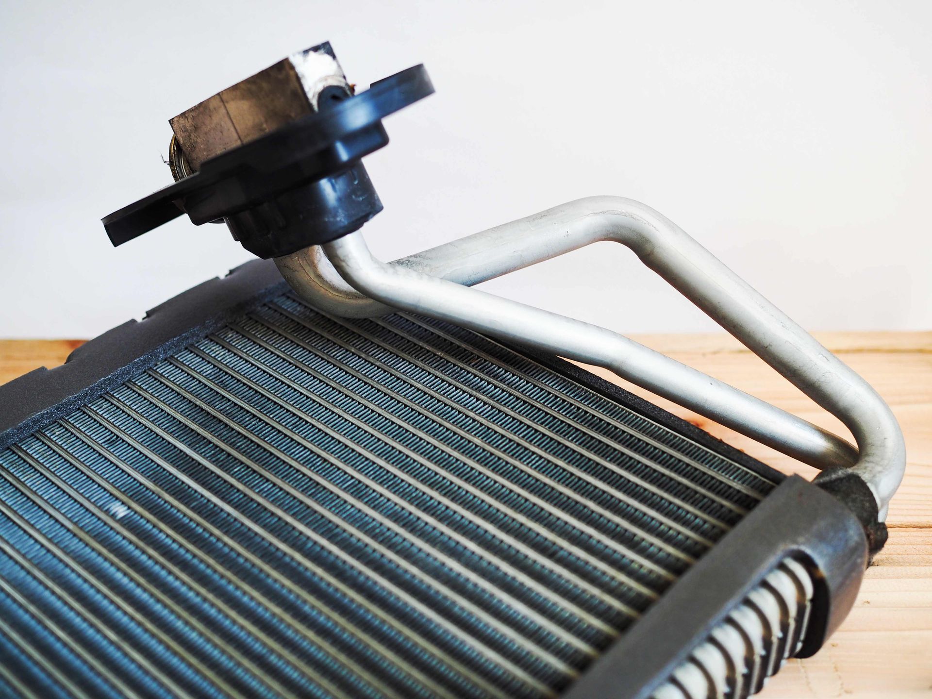 a close up of a radiator on a wooden table