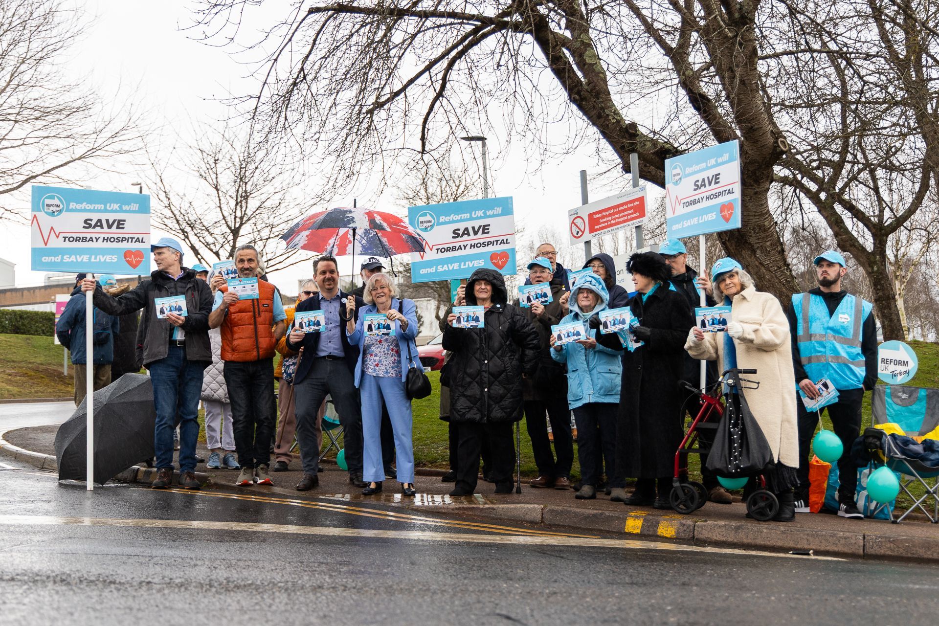 Reform UK Torbay group campaigning outside of the entrance to Torbay Hospital with Ann Widdecombe