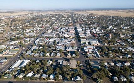 An Aerial View Of A City With Lots Of Buildings And Trees — Brisbane Moving & Storage In Roma, QLD