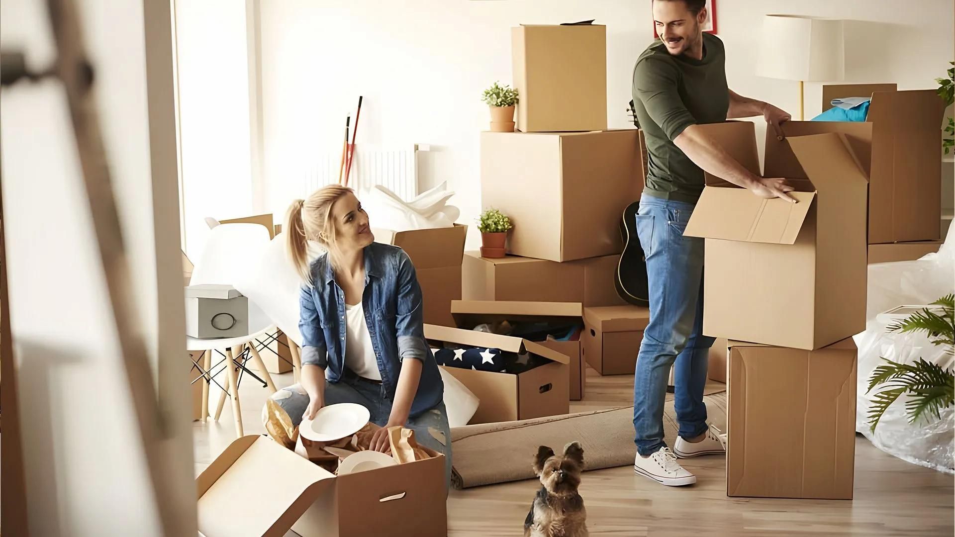 Brisbane Removals And Storage With Couple Packing Boxes