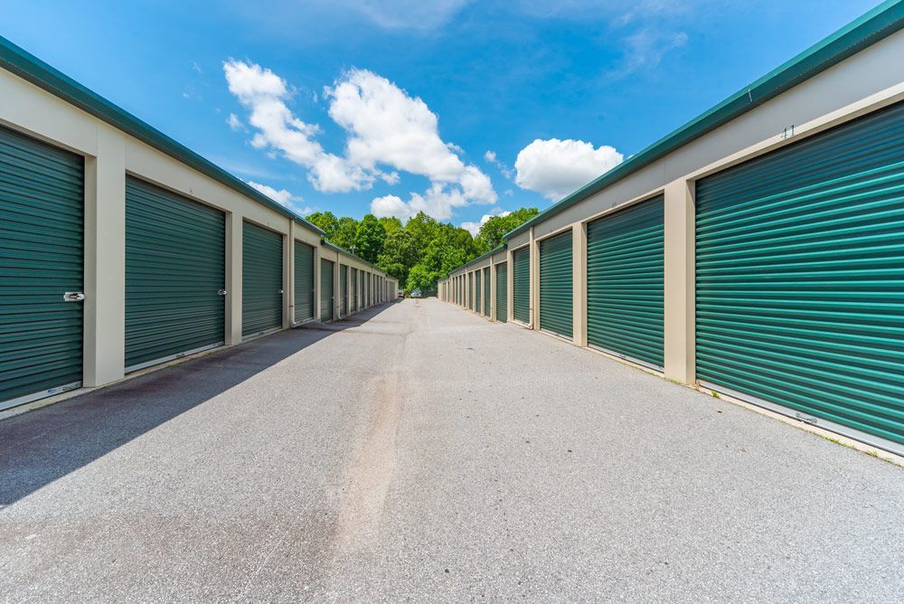 Green Self Storage Units on A Sunny Day