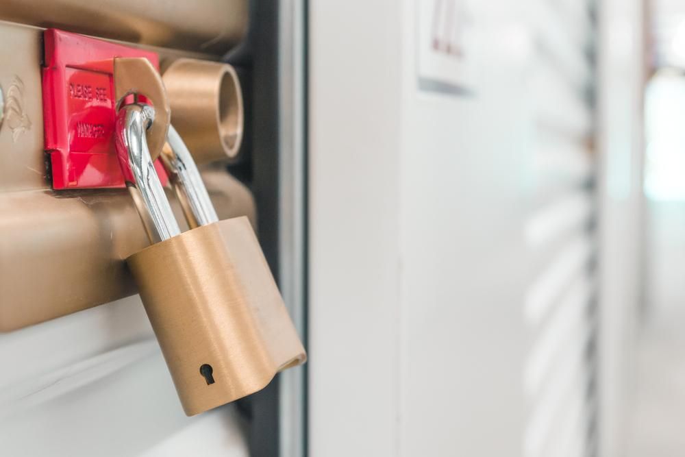 A Close Up Of A Padlock On A Door — Brisbane Moving & Storage In Acacia Ridge, QLD