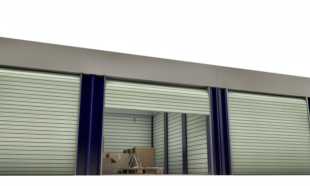 A Warehouse With A Lot Of Boxes In It And A Ladder — Brisbane Moving & Storage In Acacia Ridge, QLD