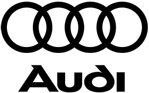 Audi logo with four black interlocking rings above the word “Audi” on a white background
