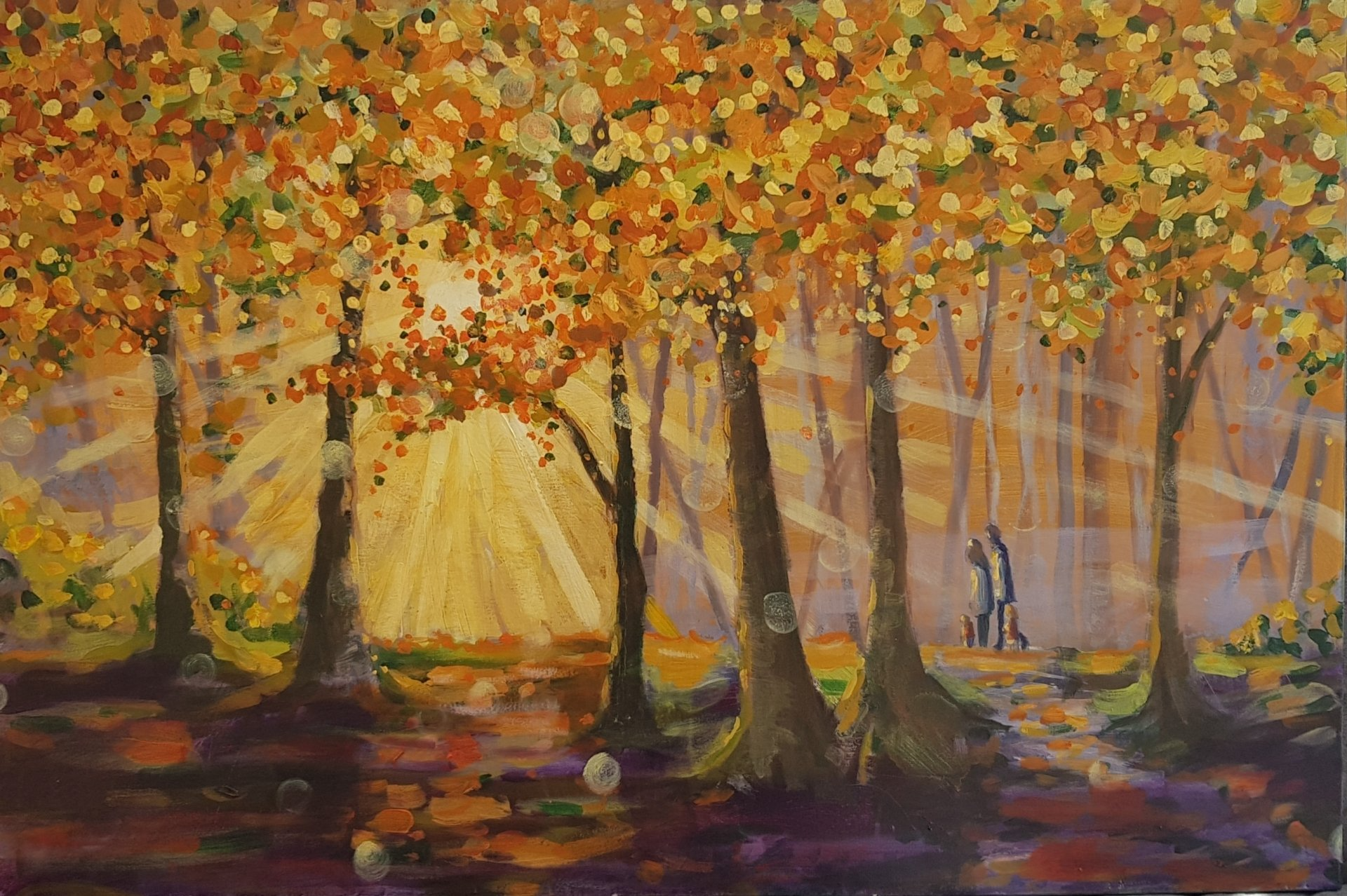 Sunbeams through autumn trees.