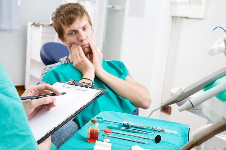 man receiving dental x-rays