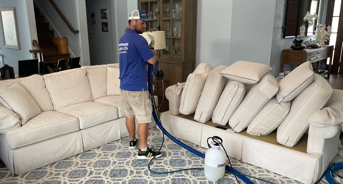Upholstery cleaning on a sofa cushion in Palm Beach County
