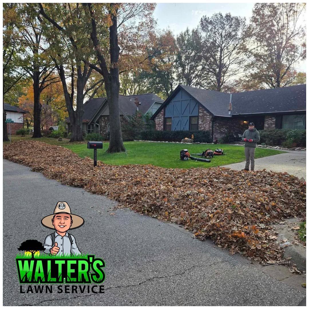 Leaf-covered driveway outside a house, with a lawn crew and Walter’s Lawn Service logo overlay.
