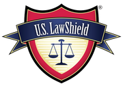A logo for u.s. law shield with a scale of justice on it A logo for u.s. law shield with a scale of justice on it