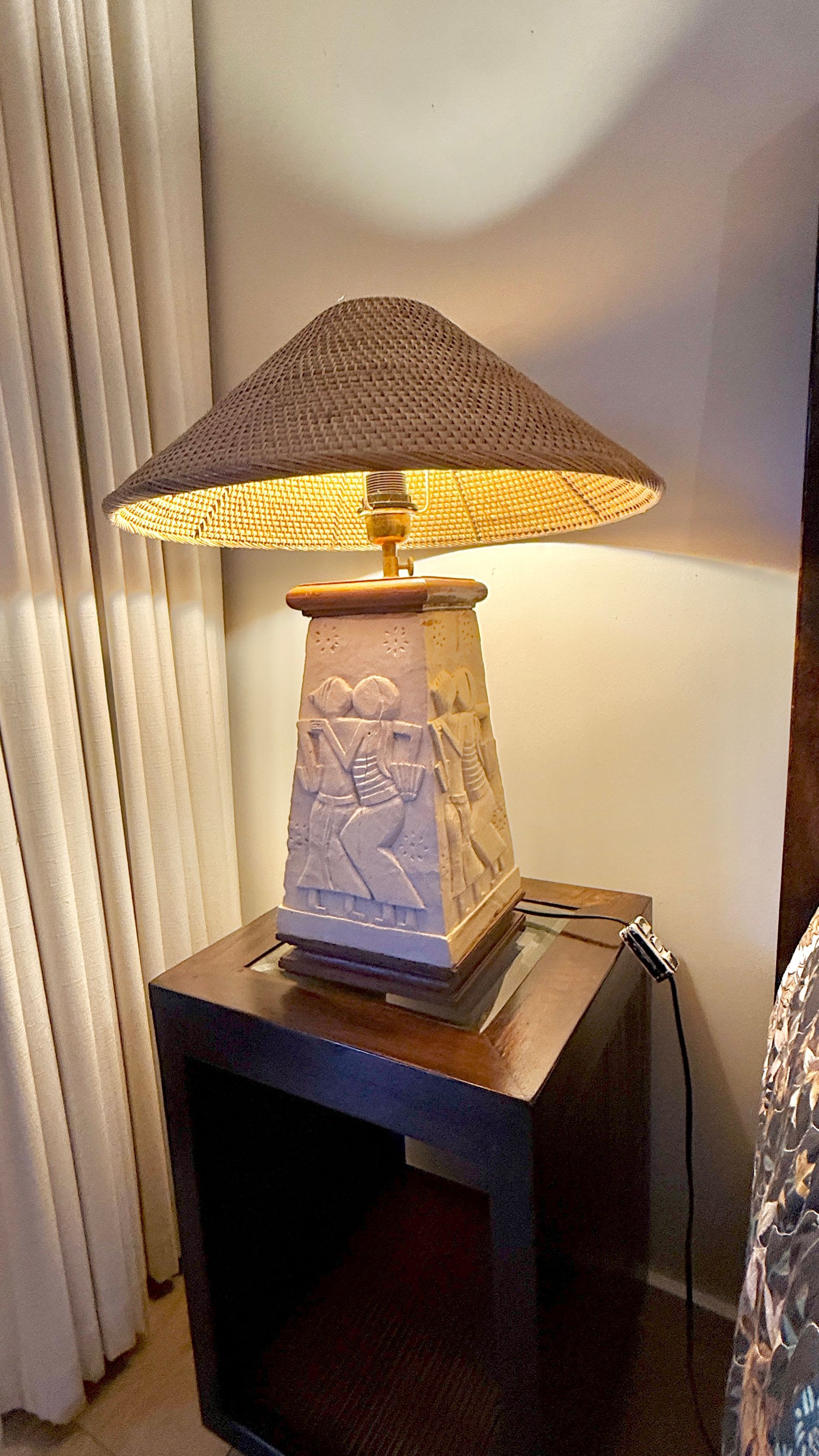 Lamp with brown shade on a square nightstand, next to a curtain and bed — Bali at the Bay in Nelson Bay, NSW