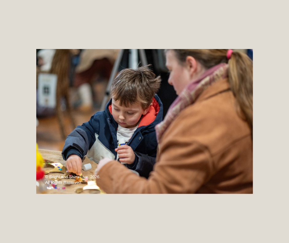 child and mother doing activity at Havelok Viking event