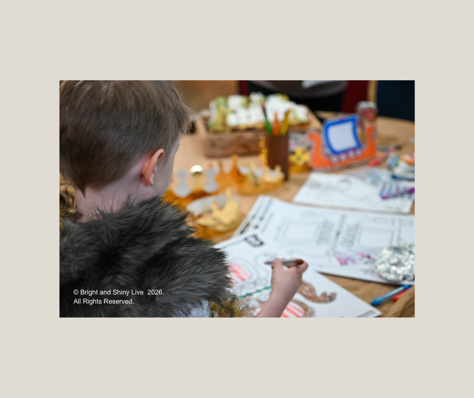 Child doing viking art at Havelok event