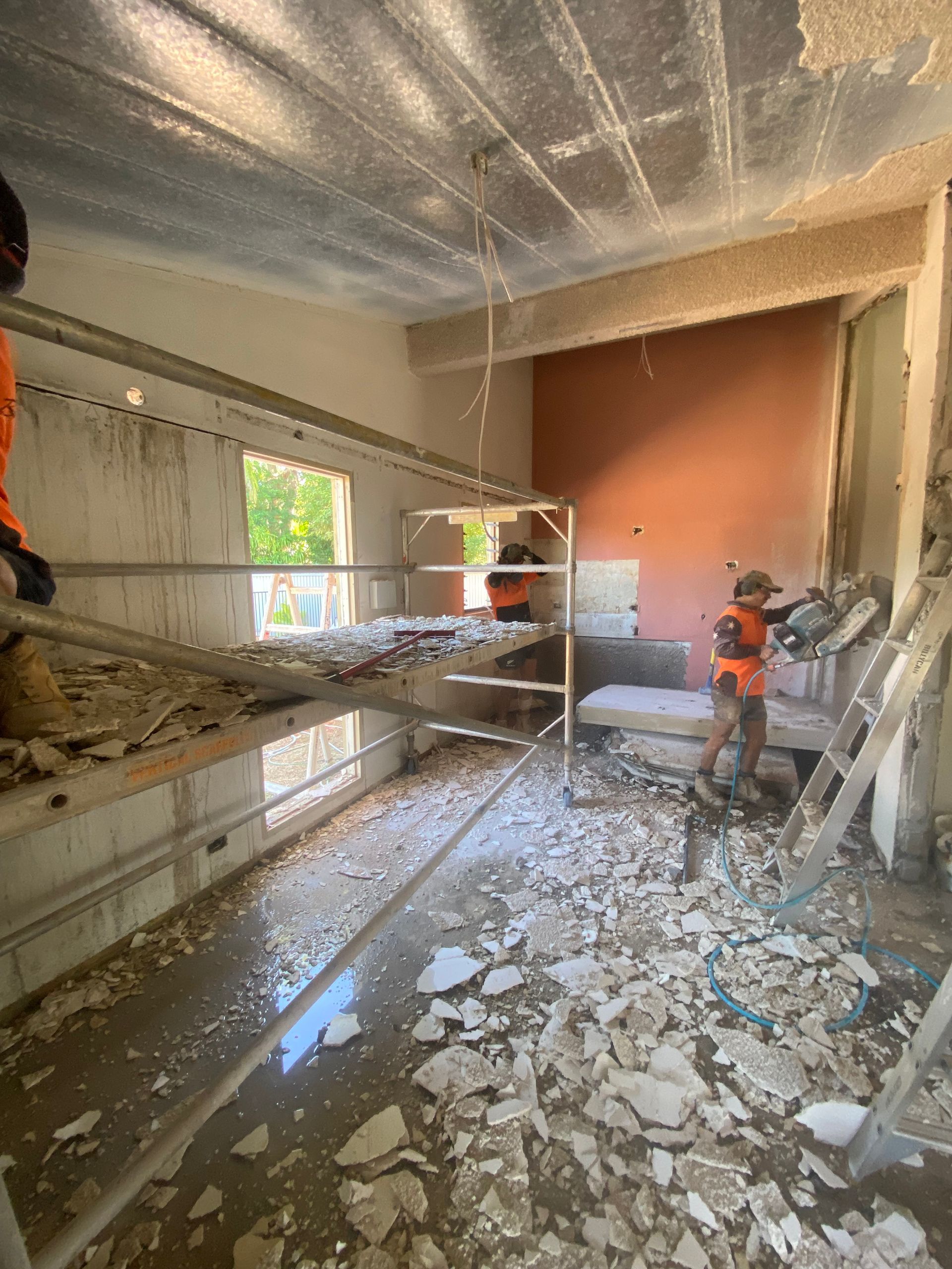 A Kitchen With a Large Island and a Refrigerator — New Home Builders in Yarrawonga, NT