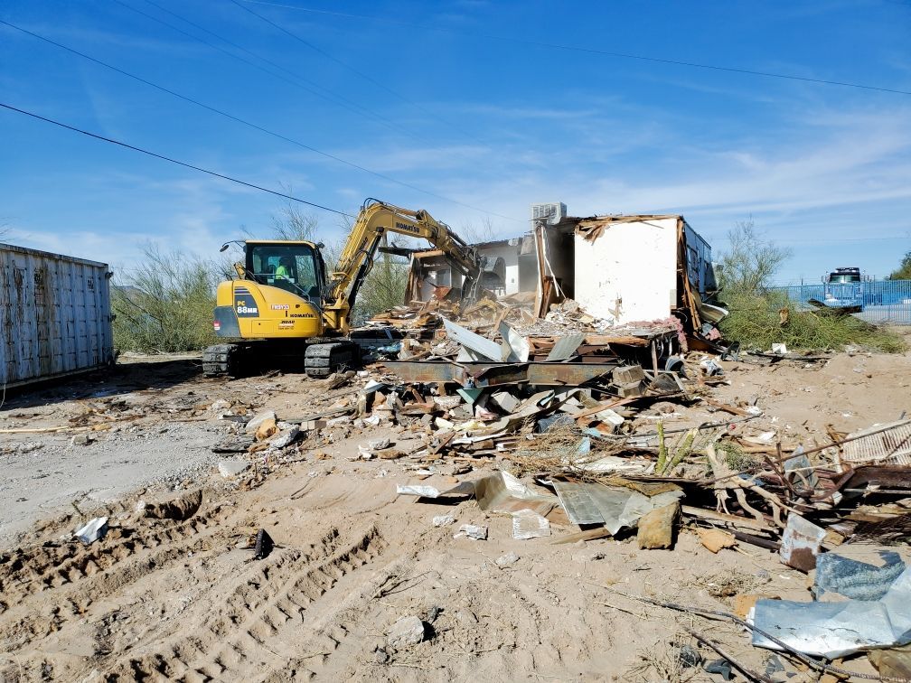 Backhoe Destroying A House — Kingman, AZ — Old Trails Demolition