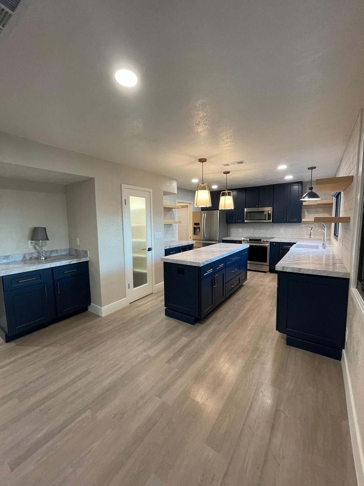 Kitchen by Casa Nova: Development Remodeling & Design LLC